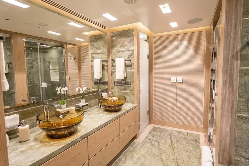 Short Story Yacht Photos Pics Luxurious yacht bathroom with glass sinks, marble countertops, and modern lighting, Horizon RP120, 2017.