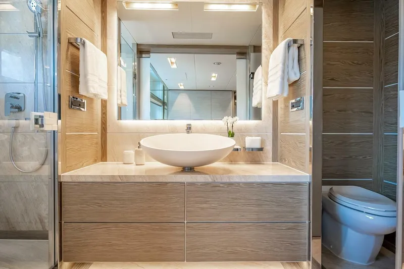 Short Story Yacht Photos Pics Luxurious bathroom in 2017 Horizon RP120 yacht with modern fixtures and elegant design.