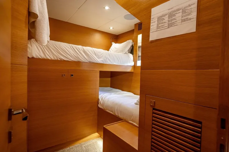 Short Story Yacht Photos Pics Compact wooden bunk bed cabin in 2017 Horizon RP120 yacht interior.