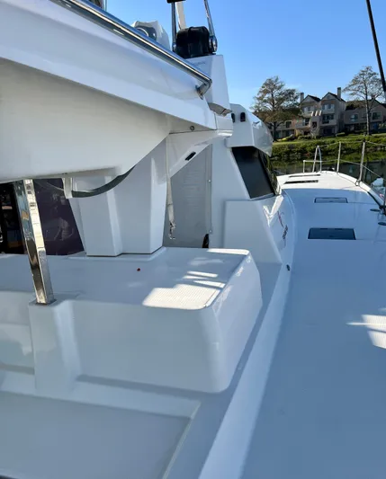 Bright Side Yacht Photos Pics 2019 Fountaine Pajot Saona 47 catamaran deck with sleek design and modern features.