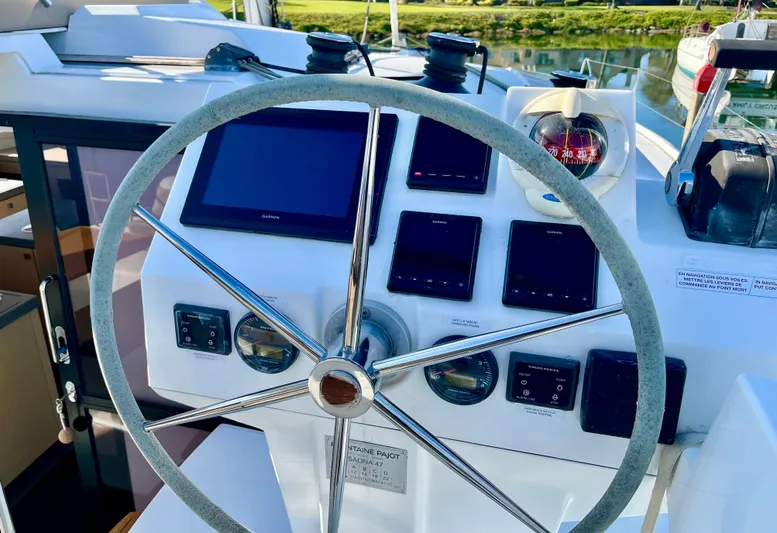 Bright Side Yacht Photos Pics Steering wheel and control panel of 2019 Fountaine Pajot Saona 47 catamaran.