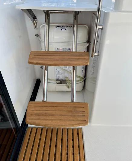 Bright Side Yacht Photos Pics Wooden steps on a 2019 Fountaine Pajot Saona 47 yacht ladder.