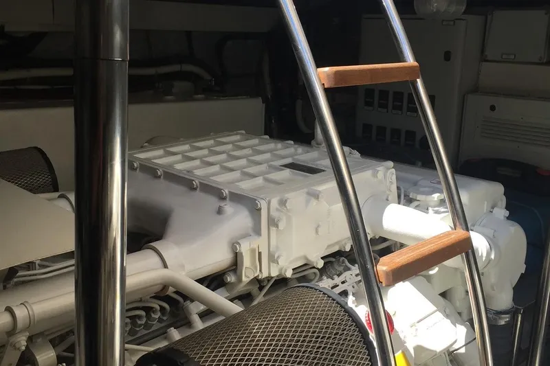  Yacht Photos Pics Engine room of 2008 Uniesse 68 yacht with visible ladder and machinery components.