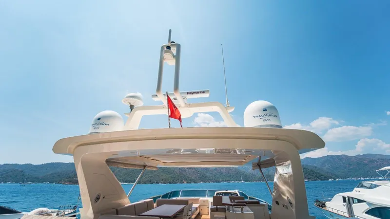  Yacht Photos Pics Luxurious 2013 Azimut 84 yacht on serene blue waters under clear skies.