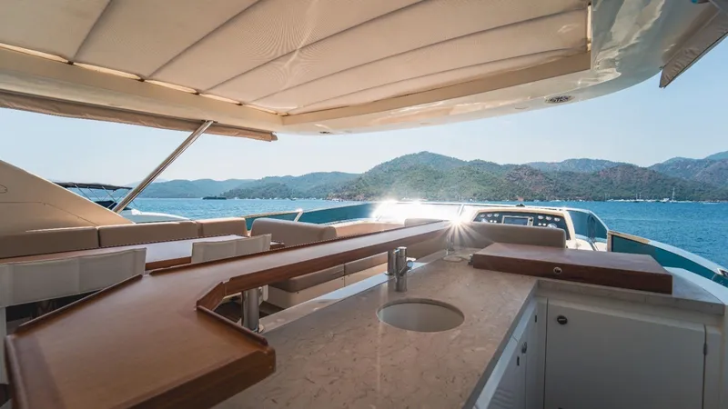  Yacht Photos Pics Luxurious 2013 Azimut 84 yacht deck with stunning ocean and mountain views.