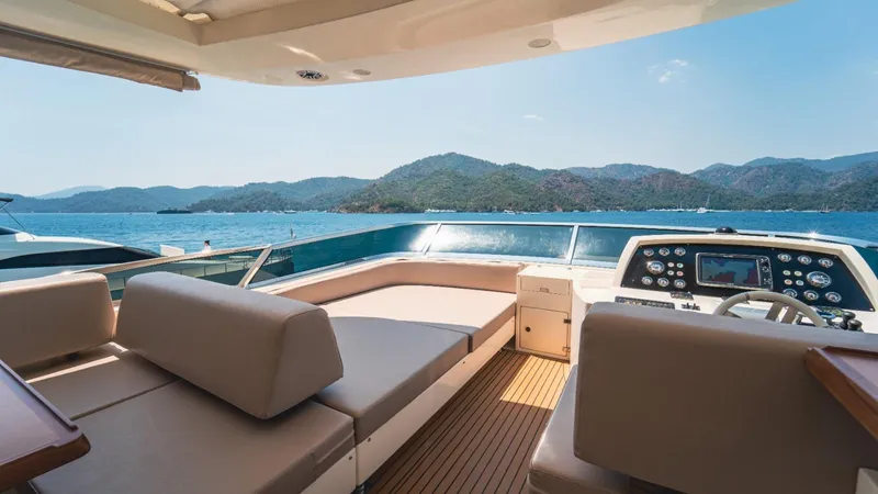  Yacht Photos Pics Luxurious 2013 Azimut 84 yacht deck with scenic ocean and mountain views.
