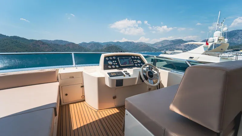  Yacht Photos Pics Luxurious 2013 Azimut 84 yacht helm with scenic ocean and mountain views.
