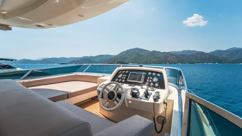  Yacht Photos Pics Luxurious 2013 Azimut 84 yacht helm with scenic ocean and mountain views.