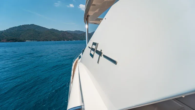  Yacht Photos Pics Azimut 84 yacht cruising on blue ocean near scenic coastline, 2013 model.