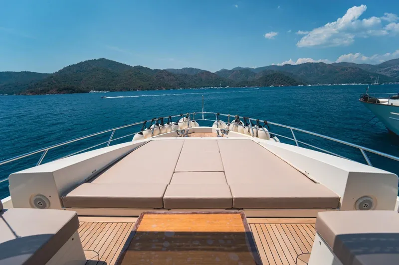  Yacht Photos Pics Luxurious 2013 Azimut 84 yacht deck with scenic ocean and mountain views.