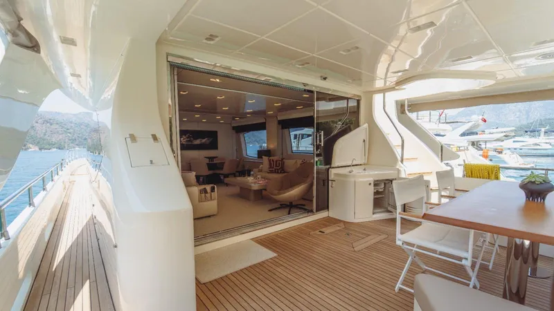  Yacht Photos Pics Luxurious 2013 Azimut 84 yacht with elegant interior and spacious deck area.