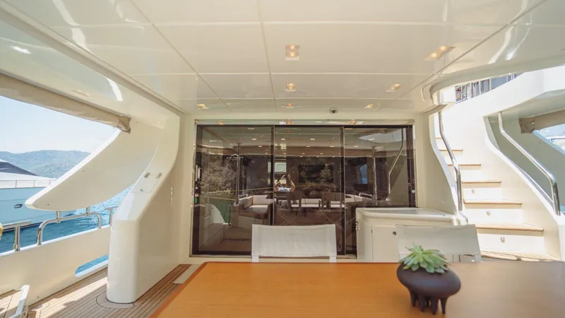  Yacht Photos Pics Luxurious 2013 Azimut 84 yacht interior with elegant dining area and scenic views.
