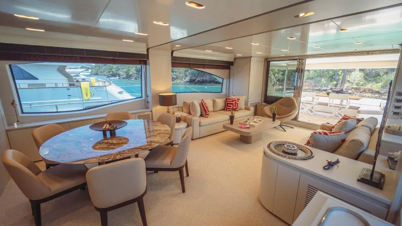  Yacht Photos Pics Luxurious interior of 2013 Azimut 84 yacht with elegant seating and dining area.