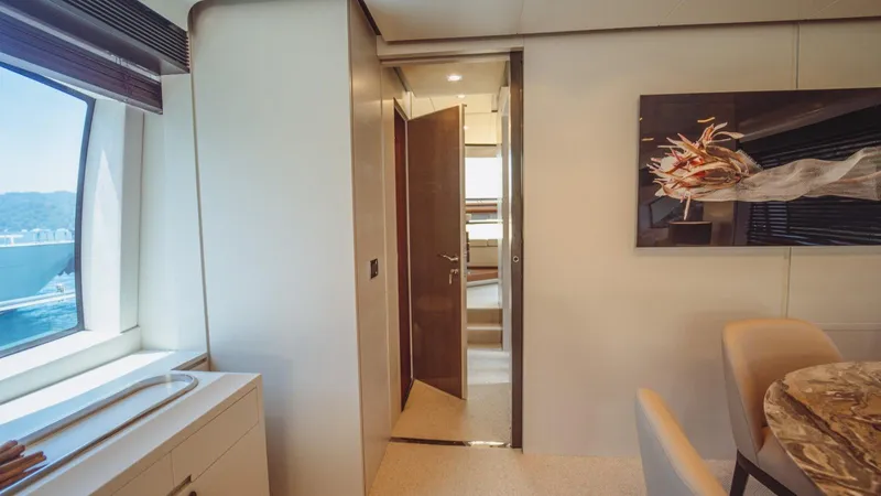  Yacht Photos Pics Luxurious interior of 2013 Azimut 84 yacht with elegant decor and scenic window view.