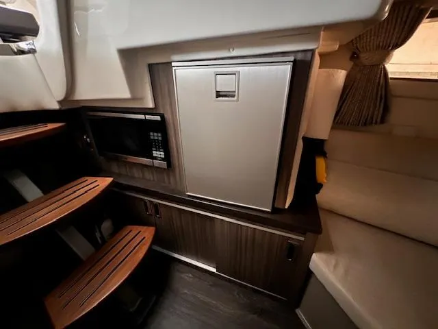 Sortuda Yacht Photos Pics Interior of 2020 Sea Ray Sundancer 320 with microwave and mini-fridge.