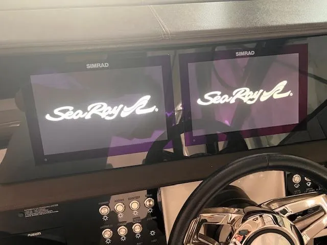 Sortuda Yacht Photos Pics 2020 Sea Ray Sundancer 320 dashboard with dual Simrad displays.