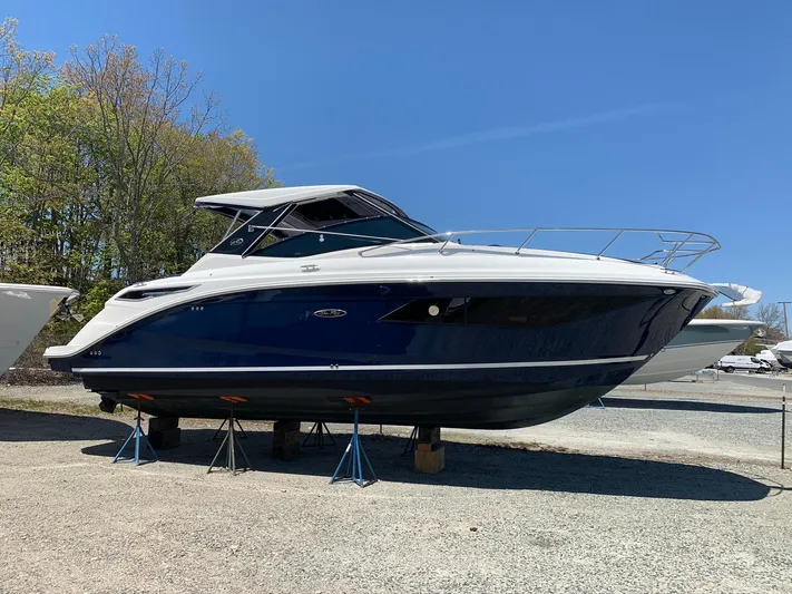 Sortuda Yacht Photos Pics 2020 Sea Ray Sundancer 320 boat on stands, side view.