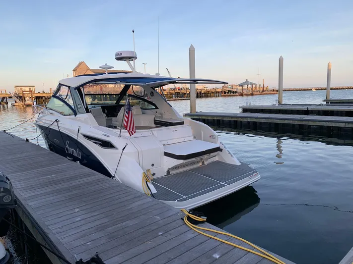 Sortuda Yacht Photos Pics 2020 Sea Ray Sundancer 320 docked at a marina.
