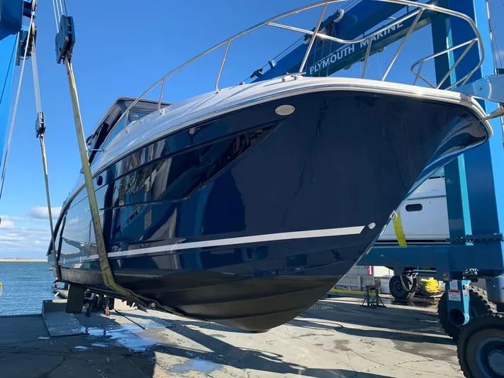 Sortuda Yacht Photos Pics 2020 Sea Ray Sundancer 320 boat being lifted at Plymouth Marine.