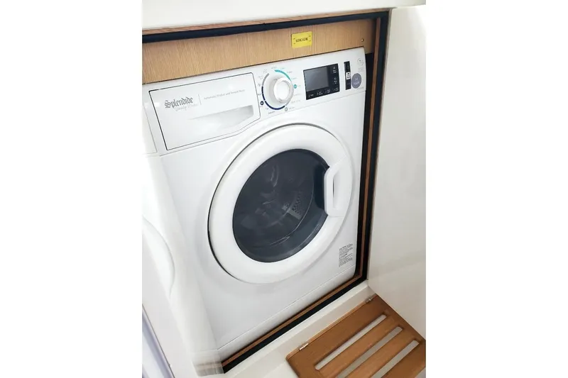 Centurion Yacht Photos Pics 2023 Bluewater 56 yacht featuring a built-in Splendide washing machine.