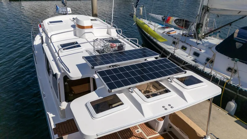  Yacht Photos Pics 2023 Ranger Tugs R-31 S with solar panels docked at marina.