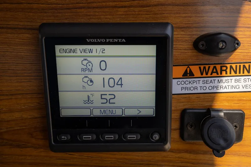  Yacht Photos Pics Volvo Penta engine display on 2023 Ranger Tugs R-31 S boat dashboard.