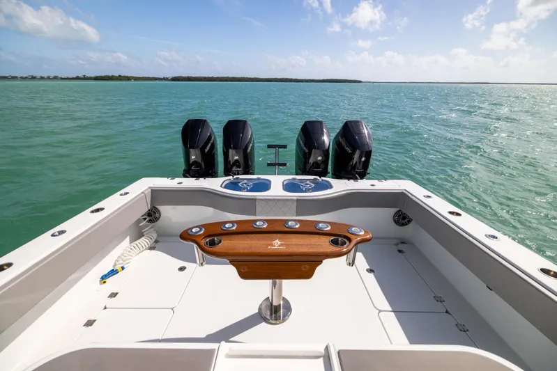  Yacht Photos Pics 2024 Freeman 42 LR boat with four engines on open water.