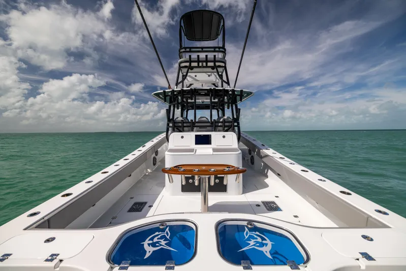  Yacht Photos Pics 2024 Freeman 42 LR boat on open water under a cloudy sky.