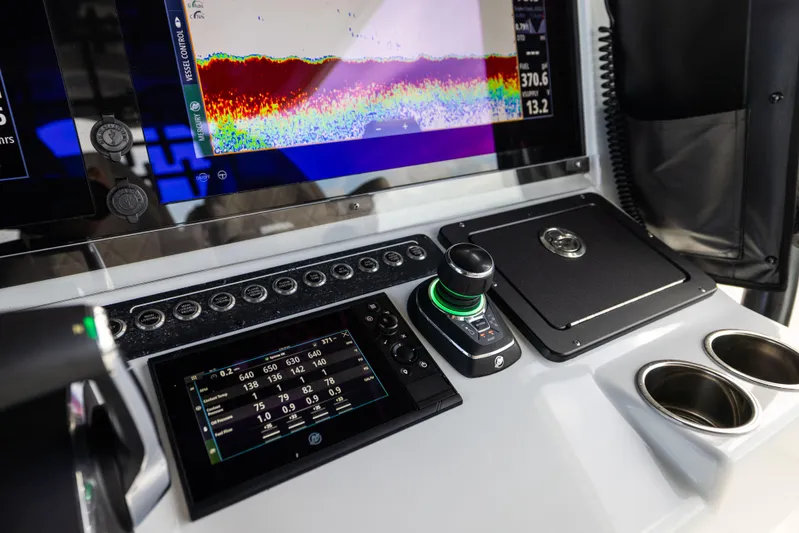  Yacht Photos Pics Control panel of 2024 Freeman 42 LR boat with advanced navigation displays.