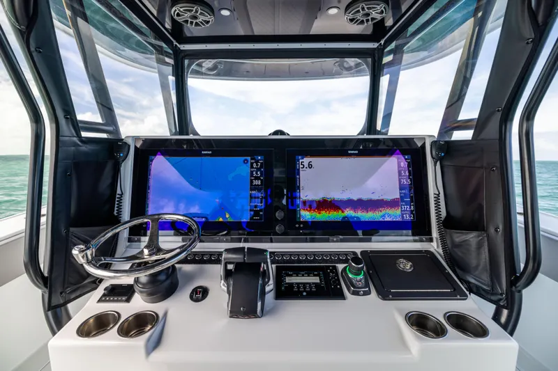  Yacht Photos Pics Helm of 2024 Freeman 42 LR boat with advanced navigation displays and controls.
