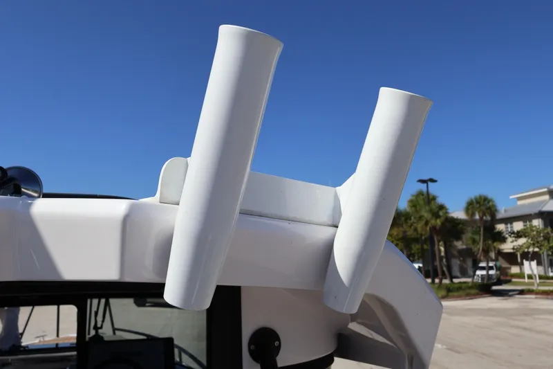  Yacht Photos Pics 2024 XO Boats EXPLR 10 S Plus rod holders against clear blue sky.