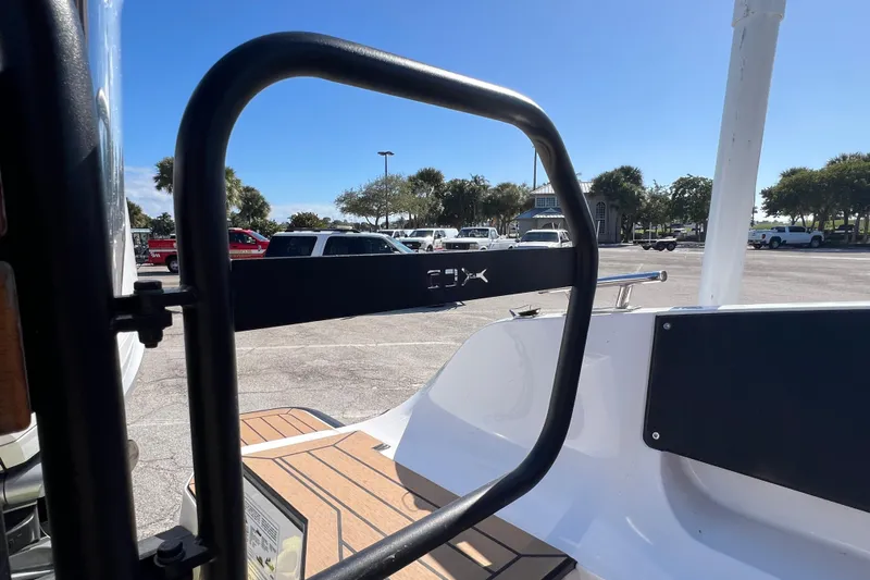  Yacht Photos Pics 2024 XO Boats EXPLR 10 S Plus, rear view, parked with visible railing and deck.