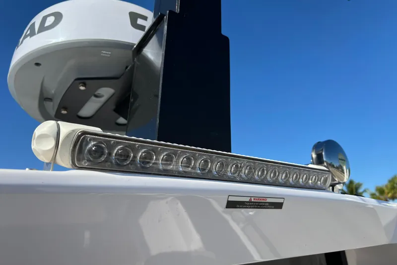  Yacht Photos Pics 2024 XO Boats EXPLR 10 S Plus radar and light detail against blue sky.