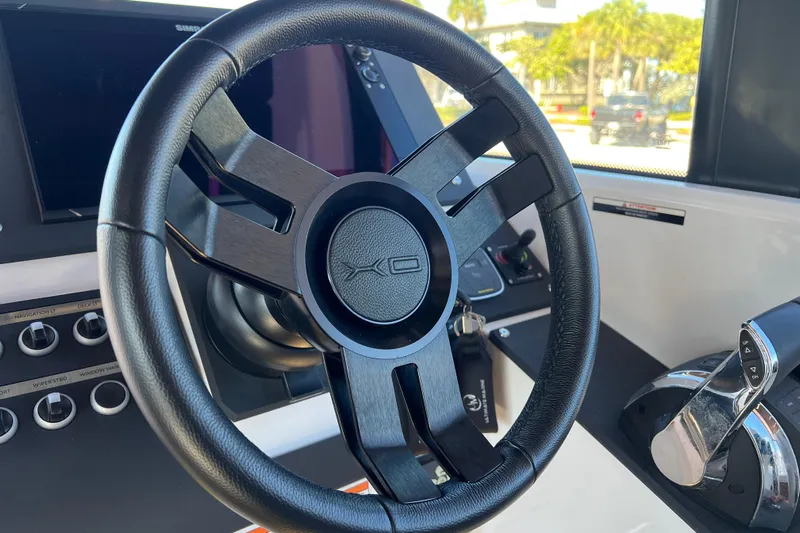  Yacht Photos Pics 2024 XO Boats EXPLR 10 S Plus steering wheel and control panel.