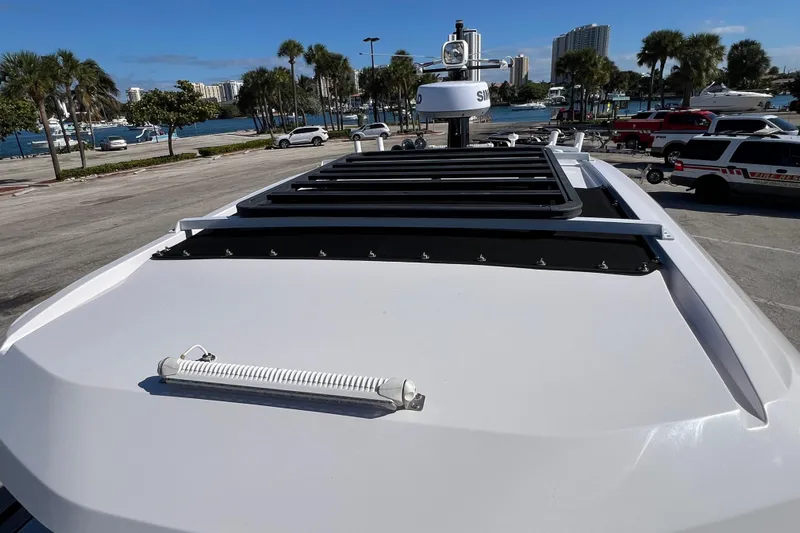  Yacht Photos Pics 2024 XO Boats EXPLR 10 S Plus roof view with coastal background.