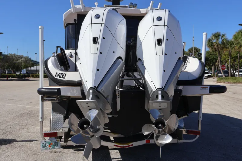  Yacht Photos Pics 2024 XO Boats EXPLR 10 S Plus with dual outboard engines, rear view.