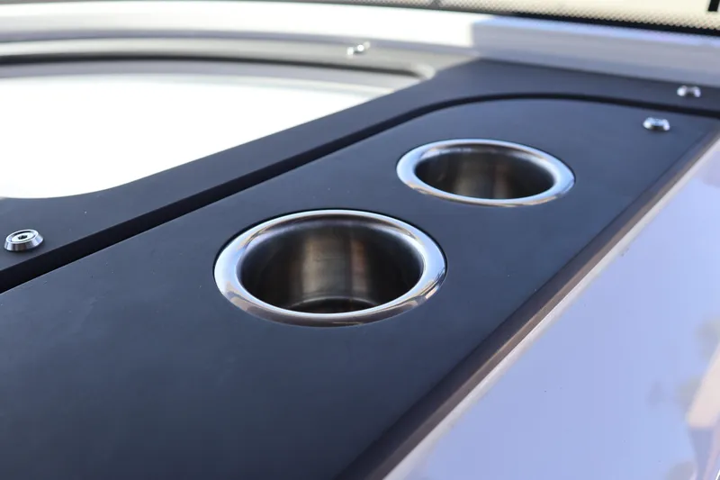  Yacht Photos Pics 2024 XO Boats EXPLR 10 S Plus cup holders on sleek black surface.
