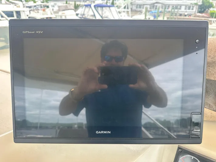  Yacht Photos Pics Garmin GPSmap XSV on 1996 Tollycraft 57 Pilothouse Motor Yacht, marina background.