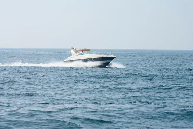 Back Up Plan Yacht Photos Pics 2001 Fairline 43 yacht cruising on open sea under clear sky.