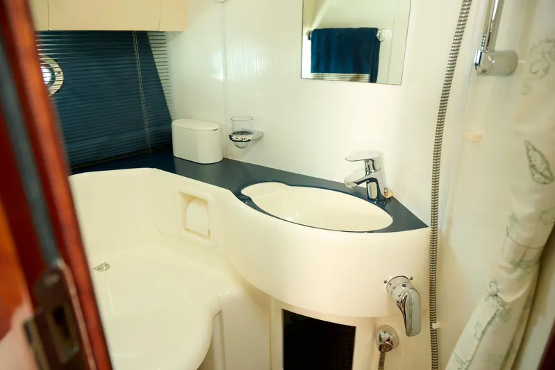 Back Up Plan Yacht Photos Pics Luxurious bathroom in 2001 Fairline 43 yacht with modern fixtures and elegant design.