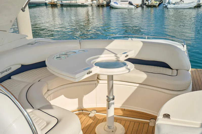 Back Up Plan Yacht Photos Pics Luxurious seating area on a 2001 Fairline 43 yacht, featuring elegant white upholstery.