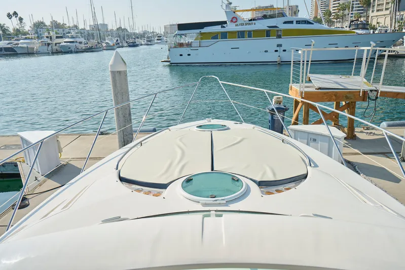 Back Up Plan Yacht Photos Pics 2001 Fairline 43 yacht docked at marina with other boats in background.