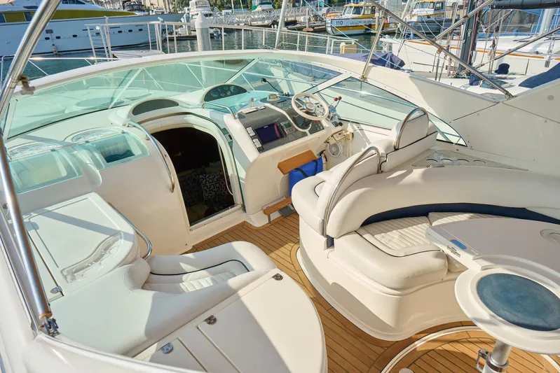 Back Up Plan Yacht Photos Pics Luxurious 2001 Fairline 43 yacht interior with elegant seating and modern helm controls.