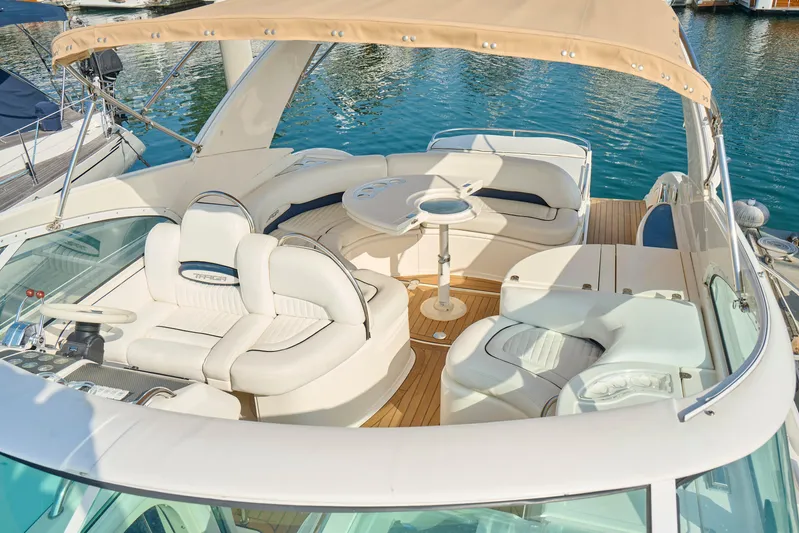 Back Up Plan Yacht Photos Pics Luxury Fairline 43 yacht interior, 2001 model, featuring elegant seating and a stylish helm.