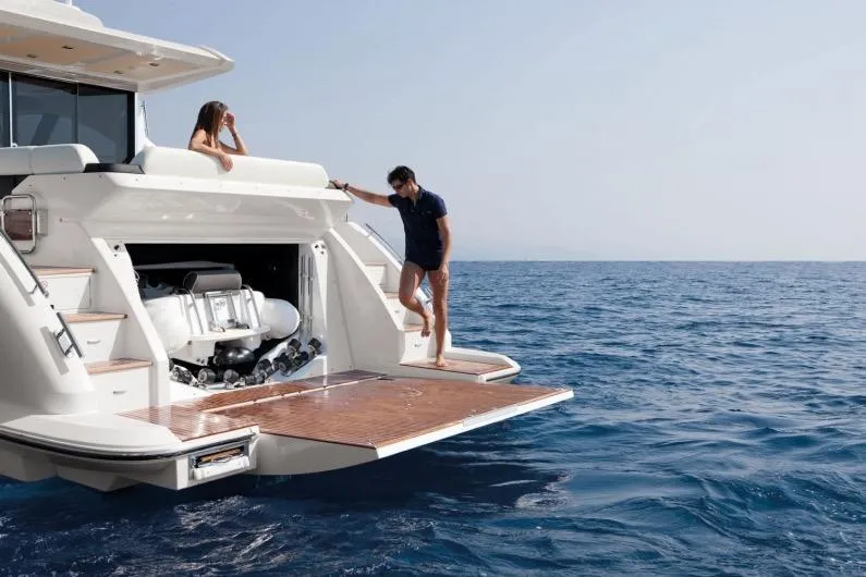 Treasure X Yacht Photos Pics Azimut 55S Yacht 2015 on open sea with people on board.