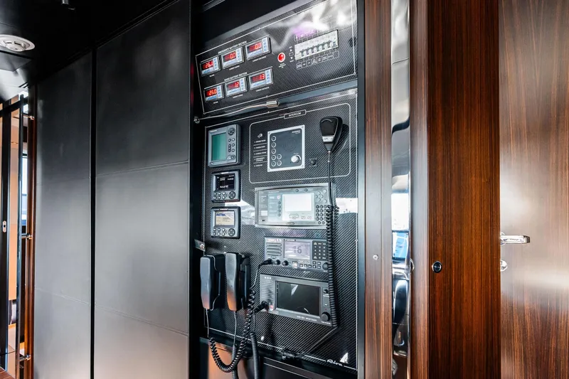Tenacious Yacht Photos Pics Control panel on 2025 Riva 130' Bellissima yacht, featuring advanced navigation and communication systems.