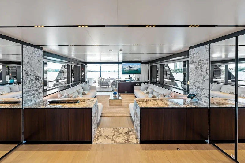 Tenacious Yacht Photos Pics Luxurious interior of 2025 Riva 130' Bellissima yacht with elegant marble and modern design.