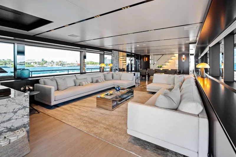 Tenacious Yacht Photos Pics Luxurious interior of 2025 Riva 130' Bellissima yacht with elegant seating and modern decor.