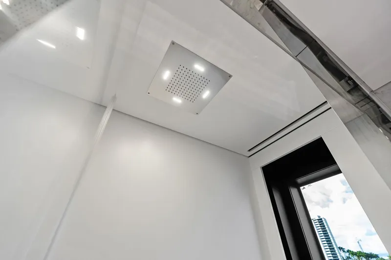 Tenacious Yacht Photos Pics Ceiling view of Riva 130' Bellissima yacht interior, featuring modern lighting, 2025 model.