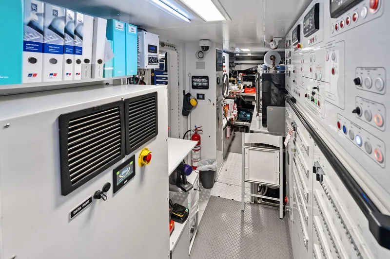 Tenacious Yacht Photos Pics Control room of 2025 Riva 130' Bellissima yacht, featuring advanced equipment and organized layout.